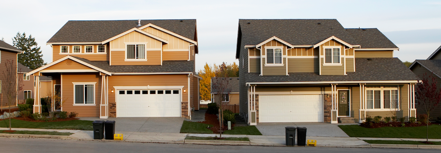 Two modern neighboring houses